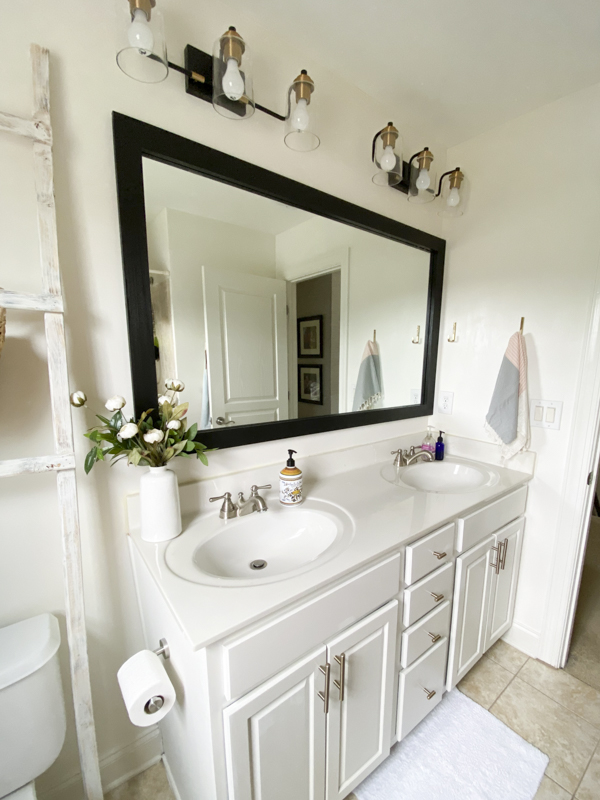 How to Frame a Bathroom Mirror - Love Your Abode